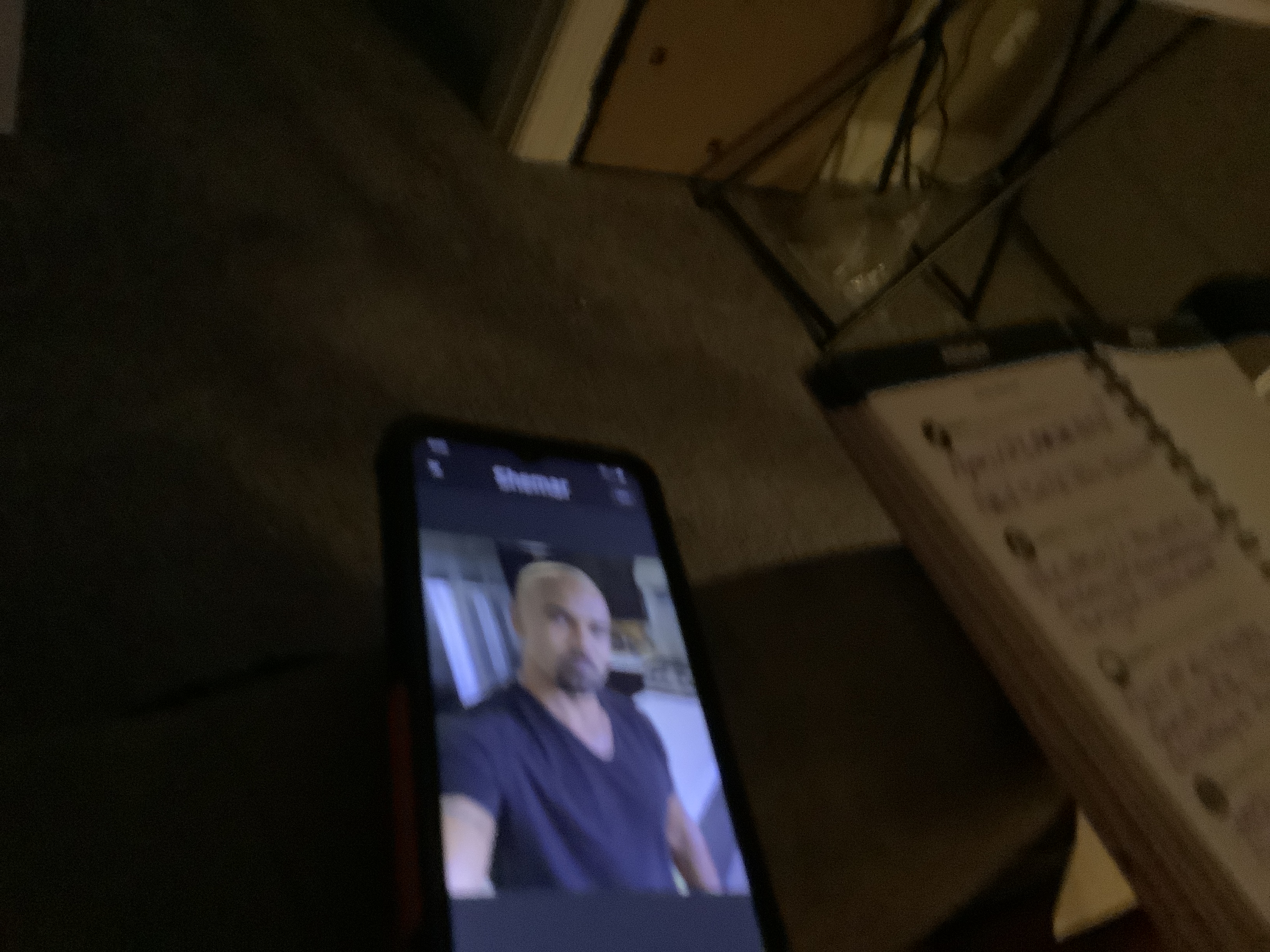 Smartphone displaying a video call - AI says Real
